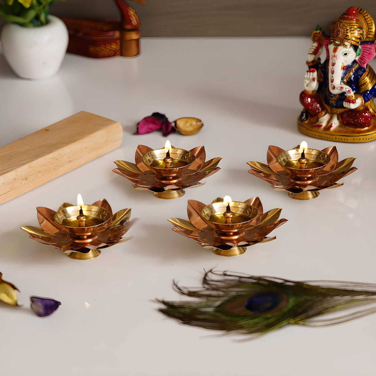 eCraftIndia Set of 4 Floral Shape Metal Diya — product image