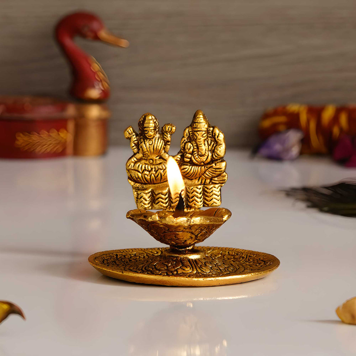 eCraftIndia Goddess Laxmi & Lord Ganesha Golden Metal Diya — product image